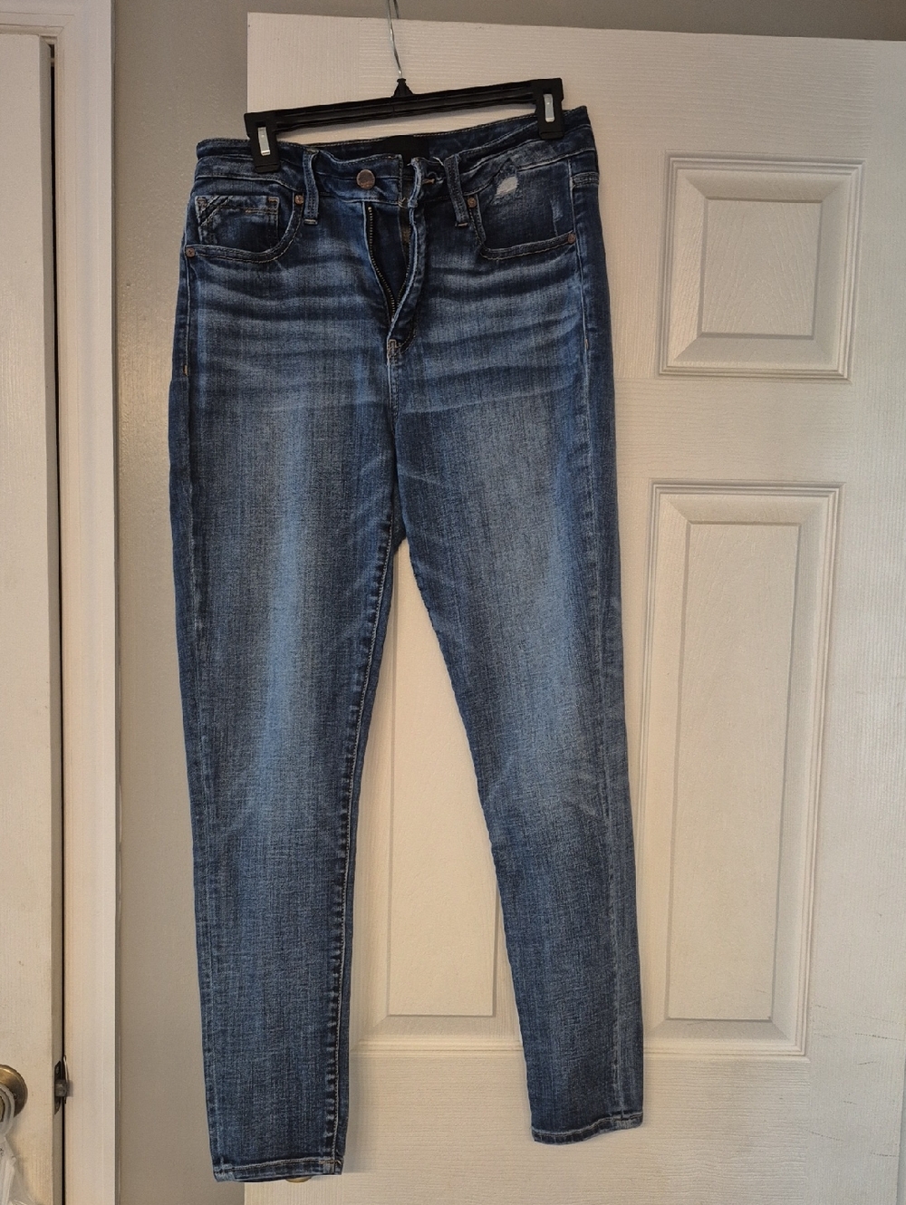 Buckle Women's Skinny Jeans — Faded Blue Stretch Denim